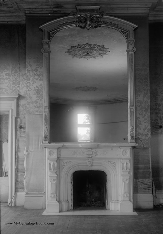 Fireplace and mirror, first floor salon, Schell Chateau, Northfield, Massachusetts.
