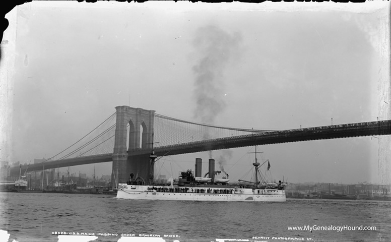 U.S.S. Maine passing under the Brooklyn Bridge, historic photo